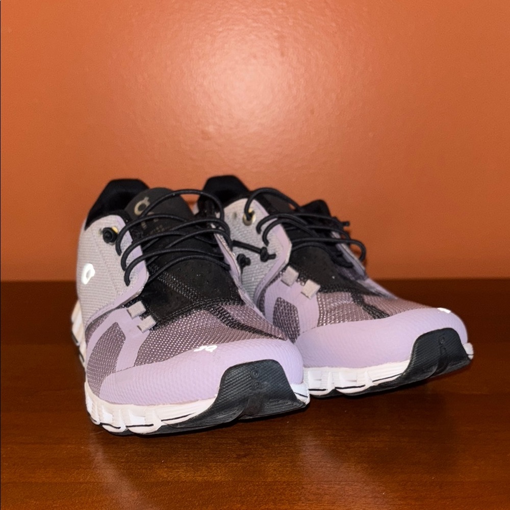 On cloud shoes size 5.